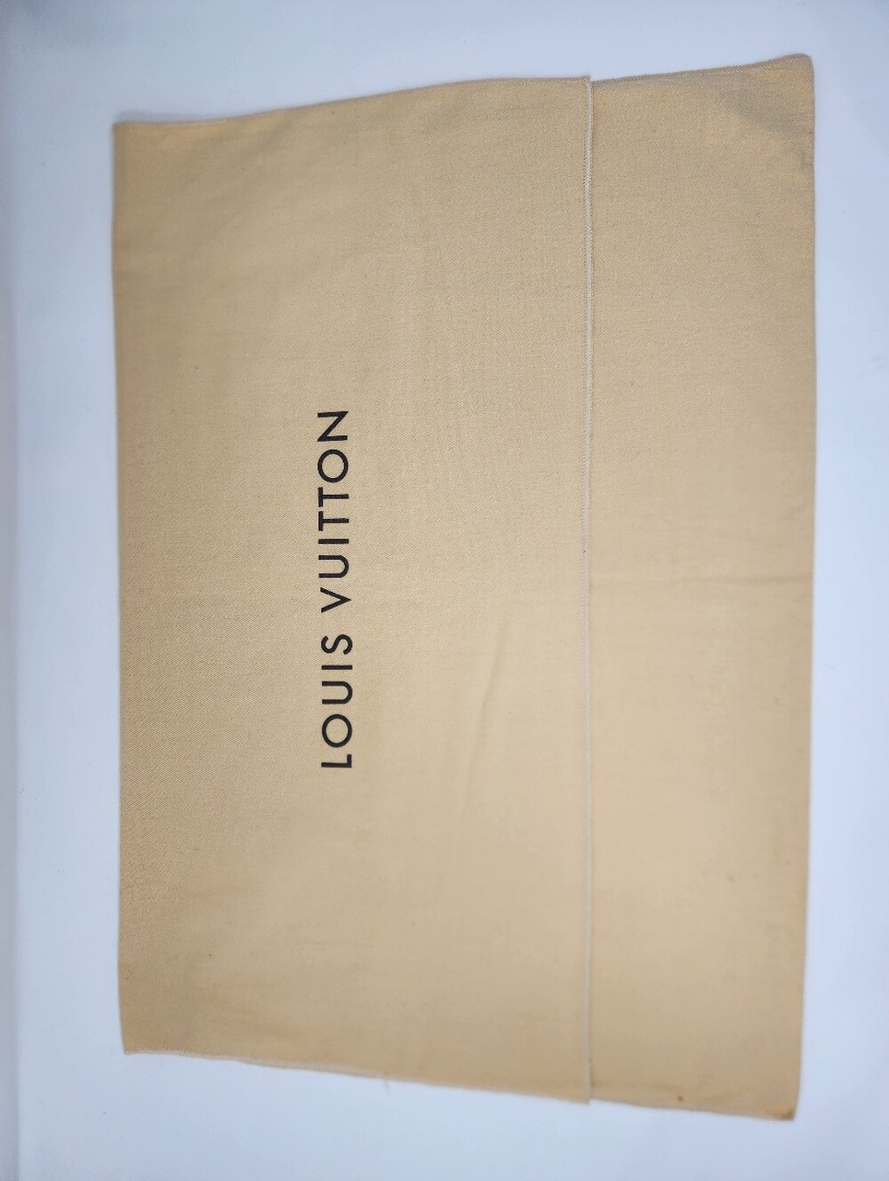 Authentic Louis Vuitton dust bag.